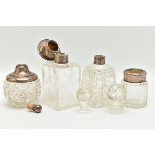 177 - FOUR SILVER TOPPED GLASS JARS, glass scent bottle with stopper and silver collar, hallmarked London,... 