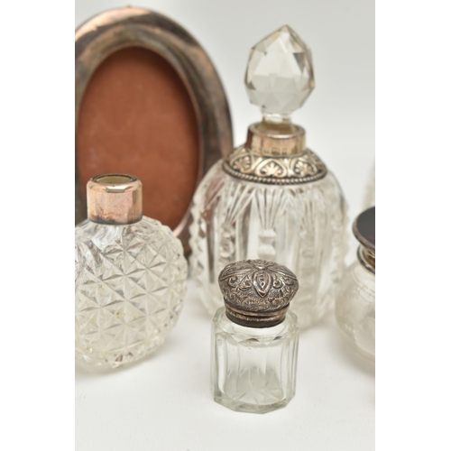 178 - A BOX OF ASSORTED SILVER MOUNTED VANITY JARS AND SCENT BOTTLES, to include a small round glass jar w... 