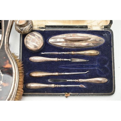 184 - A BOX OF ASSORTED SILVER AND WHITE METAL WARE, to include a silver hammer effect hand held vanity mi... 