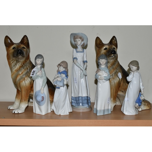 324 - FIVE NAO FIGURES AND TWO FIGURES OF GERMAN SHEPHERD DOGS, the Nao figures comprising a girl with a p... 