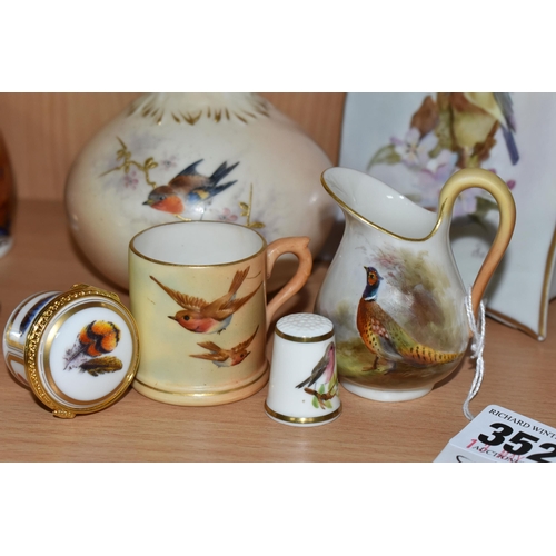 352 - A SMALL GROUP OF WORCESTER PORCELAIN, comprising a small Royal Worcester jug painted with a pheasant... 