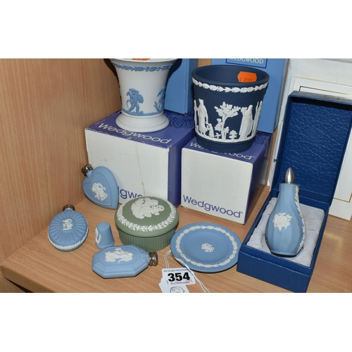 354 - A GROUP OF WEDGWOOD JASPERWARE, ten pieces comprising two boxed vases, four scent bottles - of which... 