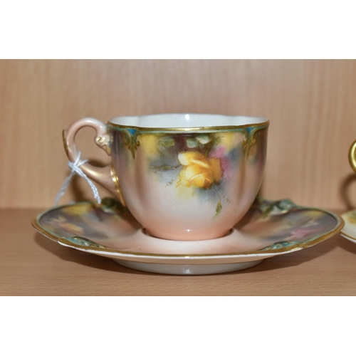 357 - A ROYAL WORCESTER CABINET CUP AND SAUCER, WITH A JAMES HADLEY & SONS TEACUP AND SAUCER, comprising a... 