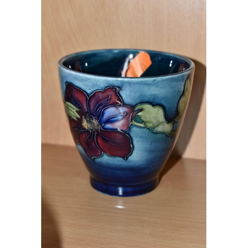 360 - A MOORCROFT POTTERY 'CLEMATIS' PATTERN SMALL PLANTER, of flared form, tube lined with purple/red cle... 