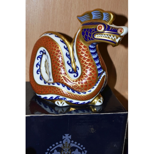 364 - TWO BOXED ROYAL CROWN DERBY PAPERWEIGHTS, comprising Imari Snake, gold stopper, and a Dragon, silver... 