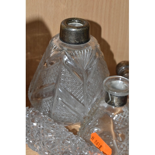 370 - SIX CUT GLASS, SILVER MOUNTED SCENT BOTTLES, to include a horn shaped bottle, with non-original silv... 