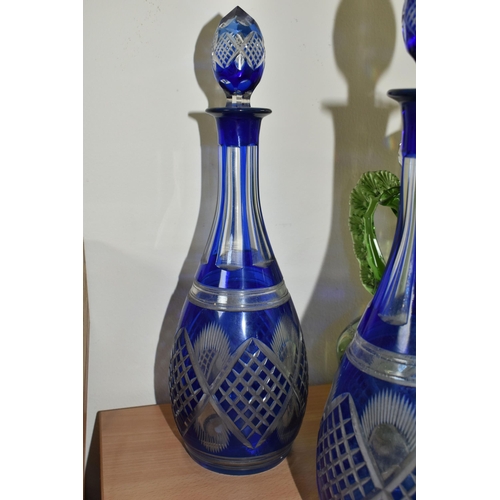 375 - A GROUP OF BOHEMIAN GLASS DECANTERS, comprising a pair of 20th Century Bohemian blue flash glass dec... 