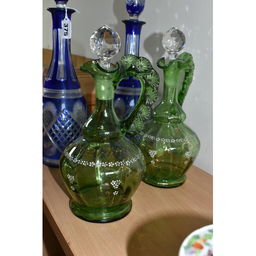 375 - A GROUP OF BOHEMIAN GLASS DECANTERS, comprising a pair of 20th Century Bohemian blue flash glass dec... 