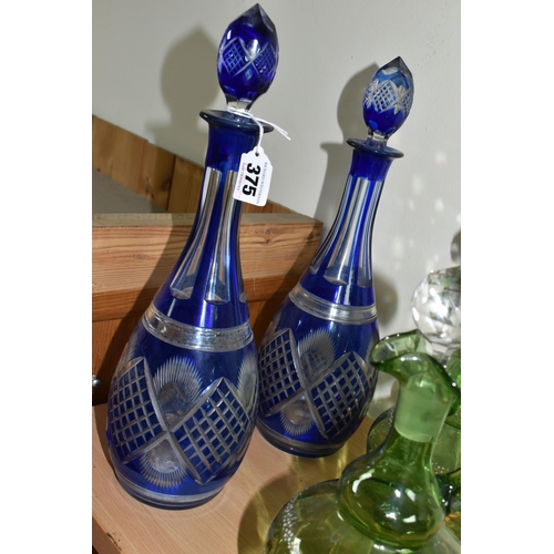 375 - A GROUP OF BOHEMIAN GLASS DECANTERS, comprising a pair of 20th Century Bohemian blue flash glass dec... 