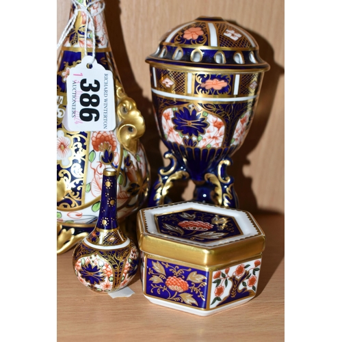 386 - A GROUP OF ROYAL CROWN DERBY IMARI PATTERN PORCELAIN, comprising a 6299 pattern footed vase with gil... 