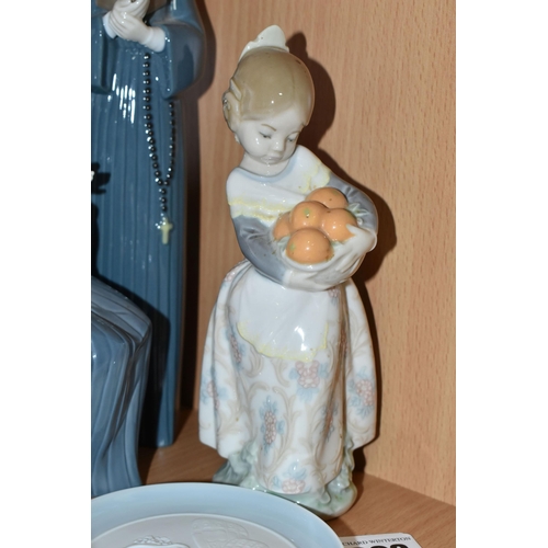 393 - THREE LLADRO FIGURES AND A LLADRO PIN DISH, comprising Time to Sew no. 5501, sculptor Jose Puche, is... 