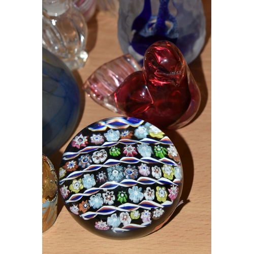 403 - A GROUP OF COLOURED GLASS, comprising a Swedish Mats Jonasson 'Tiger Lilly' paperweight, a limited e... 