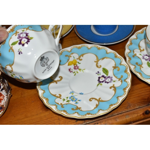 413 - A GROUP OF COFFEE CUPS AND TWO ROYAL WORCESTER 'PRIMULA' TEA CUPS AND SAUCERS, comprising a set of f... 