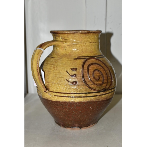 418 - MICHAEL CARDEW (1901-1983) FOR WINCHCOMBE POTTERY, a slip decorated jug with impressed Cardew and Wi... 