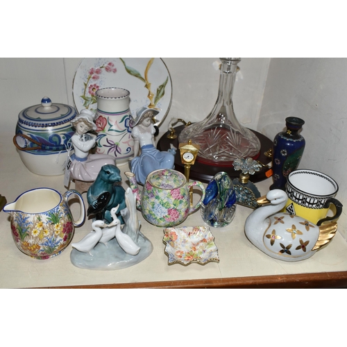 425 - A SMALL SELECTION OF DECORATIVE CERAMICS AND GLASS ETC, to include three Nao sculptures - a group of... 