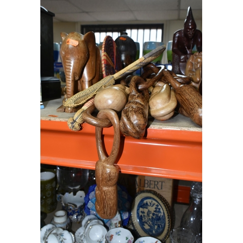 432 - A LARGE COLLECTION OF HAND CRAFTED AFRICAN WOOD STATUES FROM LIBERIA ETC, including a large panel de... 