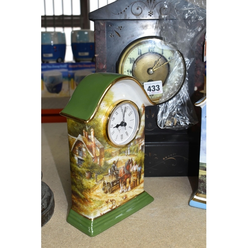 433 - TWO CARRIAGE CLOCKS AND ONE MANTEL CLOCK, including two Bradford Exchange Limited Edition Clocks 'He... 