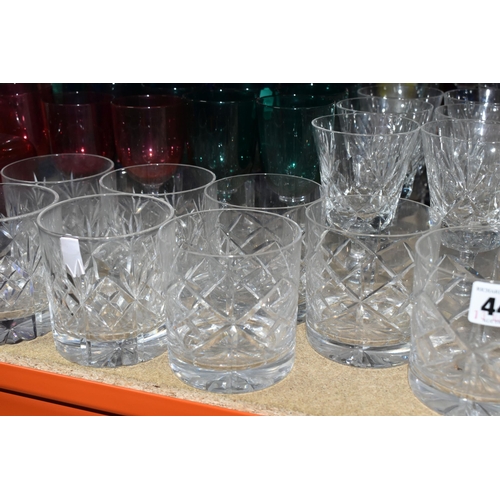 440 - A LARGE SELECTION OF CRYSTAL CUT GLASS AND COLOURED GLASS VESSELS, including two sets of Tudor Cryst... 