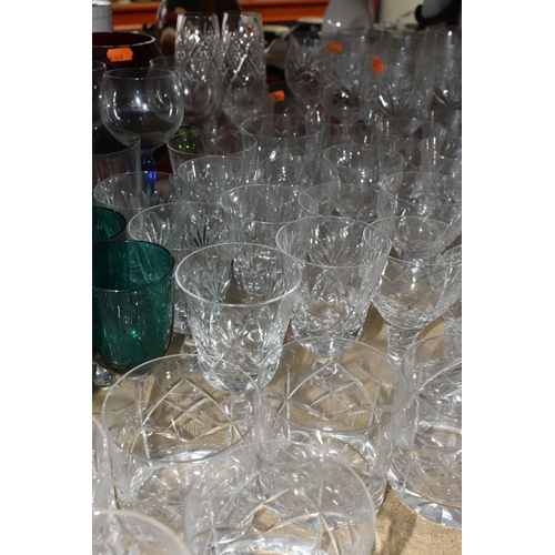 440 - A LARGE SELECTION OF CRYSTAL CUT GLASS AND COLOURED GLASS VESSELS, including two sets of Tudor Cryst... 