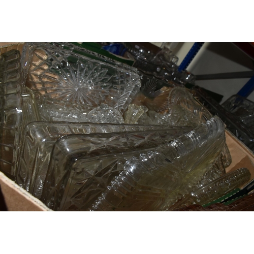 441 - FOUR BOXES OF PRESSED GLASS DRESSING TABLE SETS including a set in uranium green glass, two full box... 