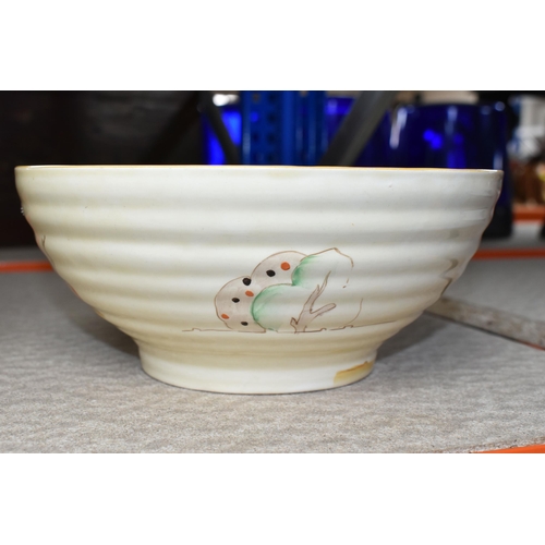 535 - A CLARICE CLIFF 'TIGER TREES' PATTERN BOWL, the ribbed bowl painted with the stylised trees on a cre... 