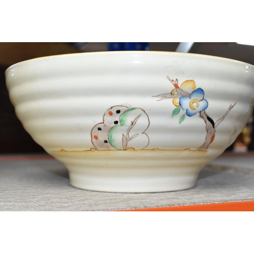 535 - A CLARICE CLIFF 'TIGER TREES' PATTERN BOWL, the ribbed bowl painted with the stylised trees on a cre... 