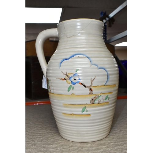 536 - A CLARICE CLIFF SINGLE HANDLED LOTUS JUG, in Tiger Tree pattern, painted with a stylised tree on a c... 