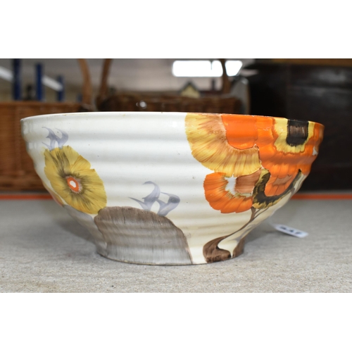 537 - A CLARICE CLIFF BIZARRE BOWL, in Rhodanthe pattern, the ribbed bowl painted with flowers in autumnal... 