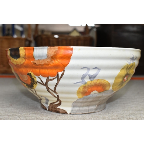 537 - A CLARICE CLIFF BIZARRE BOWL, in Rhodanthe pattern, the ribbed bowl painted with flowers in autumnal... 