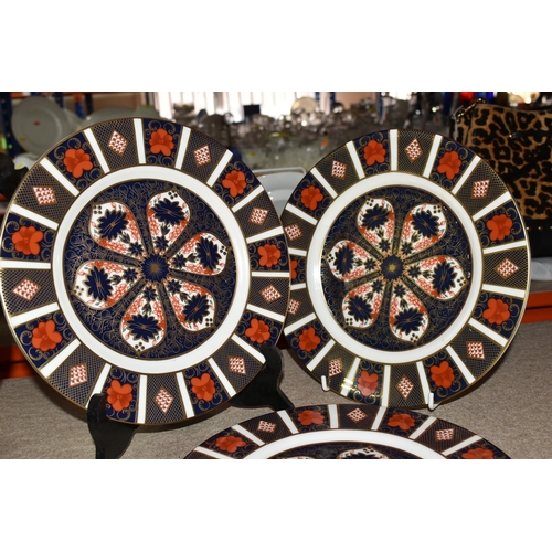 541 - FOUR PIECES OF ROYAL CROWN DERBY OLD IMARI 1128, comprising three 23cm plates and the top of an oval... 