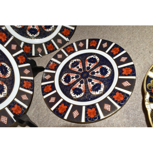 541 - FOUR PIECES OF ROYAL CROWN DERBY OLD IMARI 1128, comprising three 23cm plates and the top of an oval... 