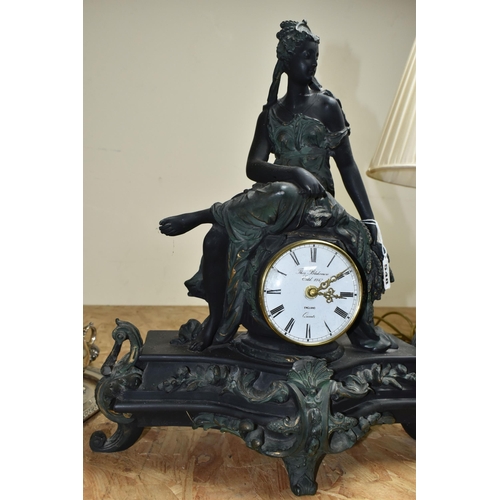 548 - A FIGURAL MANTEL CLOCK AND AN ONEIDA PLATED TEA AND COFFEE SET, comprising a resin figural mantel cl... 