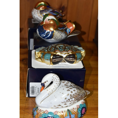 556 - FOUR ROYAL CROWN DERBY PAPERWEIGHTS, comprising boxed Teal with gold stopper, boxed Mandarin Duck wi... 