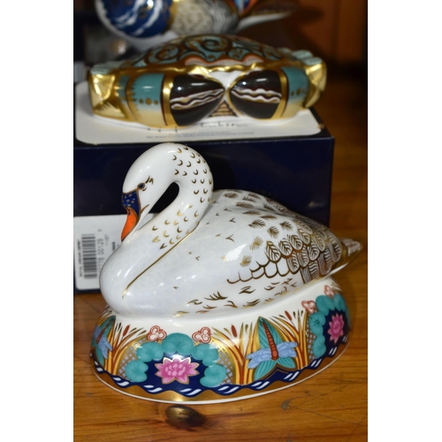 556 - FOUR ROYAL CROWN DERBY PAPERWEIGHTS, comprising boxed Teal with gold stopper, boxed Mandarin Duck wi... 