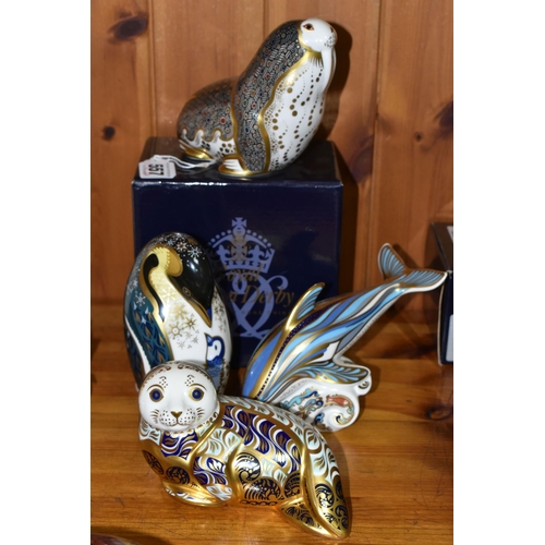 557 - FOUR ROYAL CROWN DERBY PAPERWEIGHTS, comprising boxed Russian Walrus with gold 21st anniversary stop... 