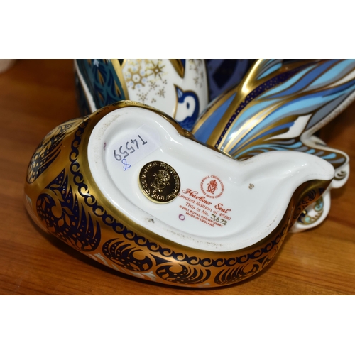 557 - FOUR ROYAL CROWN DERBY PAPERWEIGHTS, comprising boxed Russian Walrus with gold 21st anniversary stop... 