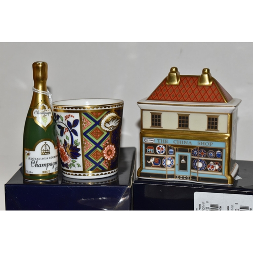 565 - A GROUP OF BOXED ROYAL CROWN DERBY GIFTWARE, comprising a champagne bottle and ice bucket, 'The Chin... 