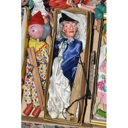 580 - A QUANTITY OF BOXED AND UNBOXED VINTAGE PELHAM PUPPETS, to include several earlier models with lead ... 