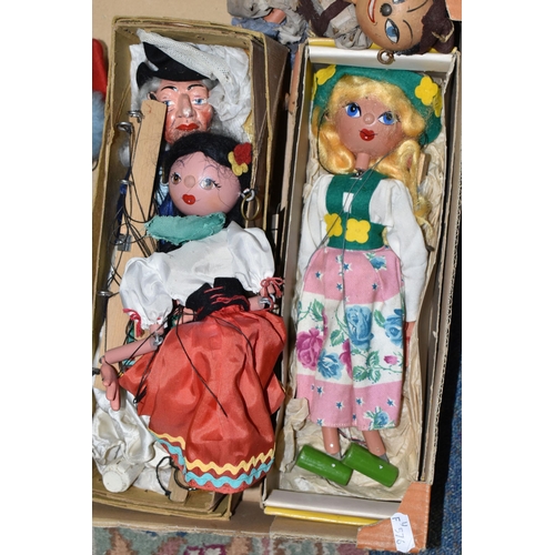 580 - A QUANTITY OF BOXED AND UNBOXED VINTAGE PELHAM PUPPETS, to include several earlier models with lead ... 