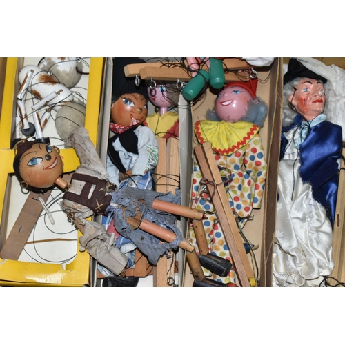 580 - A QUANTITY OF BOXED AND UNBOXED VINTAGE PELHAM PUPPETS, to include several earlier models with lead ... 