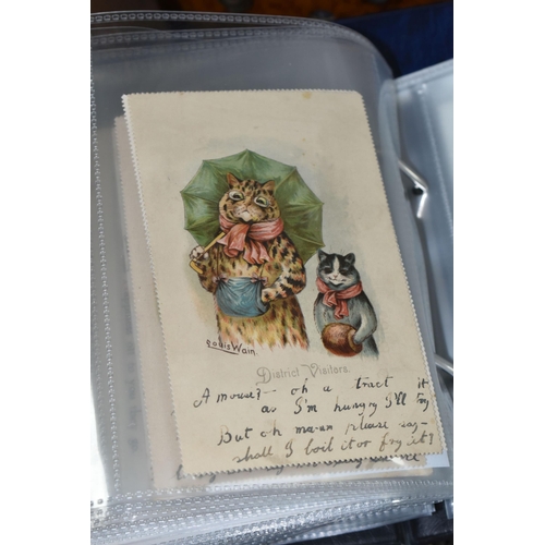 590 - TWO BOXES OF POSTCARDS AND SUNDRIES, to include a postcard album containing over one hundred and fif... 