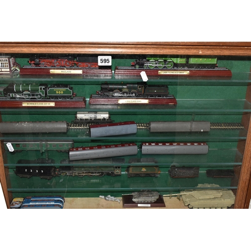 595 - A WALL MOUNTED WOODEN GLASS FRONTED SHELVING UNIT CONTAINING MODEL RAILWAY ITEMS, to include unboxed... 