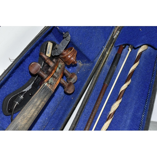 605 - A CASED VIOLIN, two piece back, ebonized fingerboard, in a hard fitted case with two bows - one mark... 