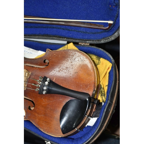 605 - A CASED VIOLIN, two piece back, ebonized fingerboard, in a hard fitted case with two bows - one mark... 