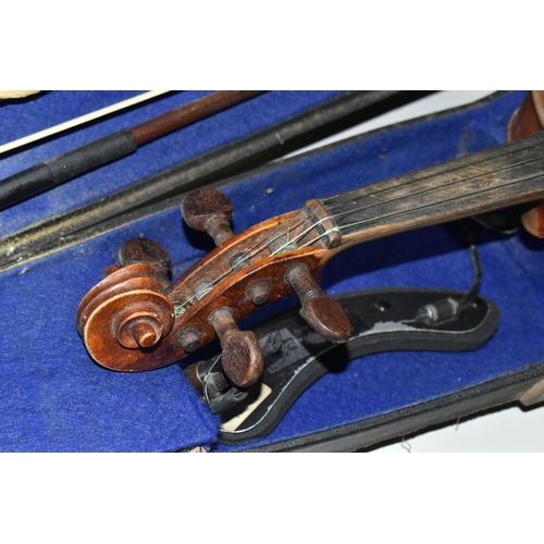 605 - A CASED VIOLIN, two piece back, ebonized fingerboard, in a hard fitted case with two bows - one mark... 