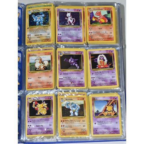 610 - FOLDER OF POKEMON CARDS, includes cards from Base Set, Jungle Set and Fossil set, card condition var... 