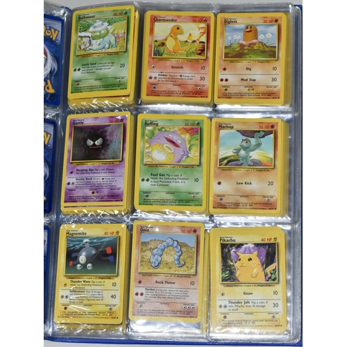 610 - FOLDER OF POKEMON CARDS, includes cards from Base Set, Jungle Set and Fossil set, card condition var... 