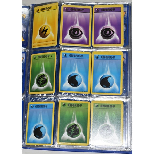 610 - FOLDER OF POKEMON CARDS, includes cards from Base Set, Jungle Set and Fossil set, card condition var... 