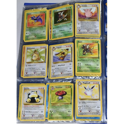 610 - FOLDER OF POKEMON CARDS, includes cards from Base Set, Jungle Set and Fossil set, card condition var... 