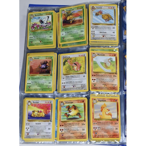 610 - FOLDER OF POKEMON CARDS, includes cards from Base Set, Jungle Set and Fossil set, card condition var... 